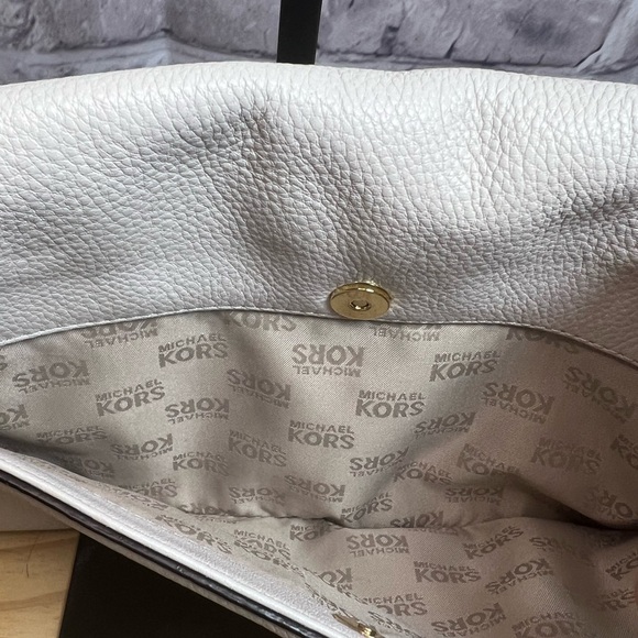 Michael Kors Pebbled Leather Clutch with Removable Strap - Picture 9 of 16